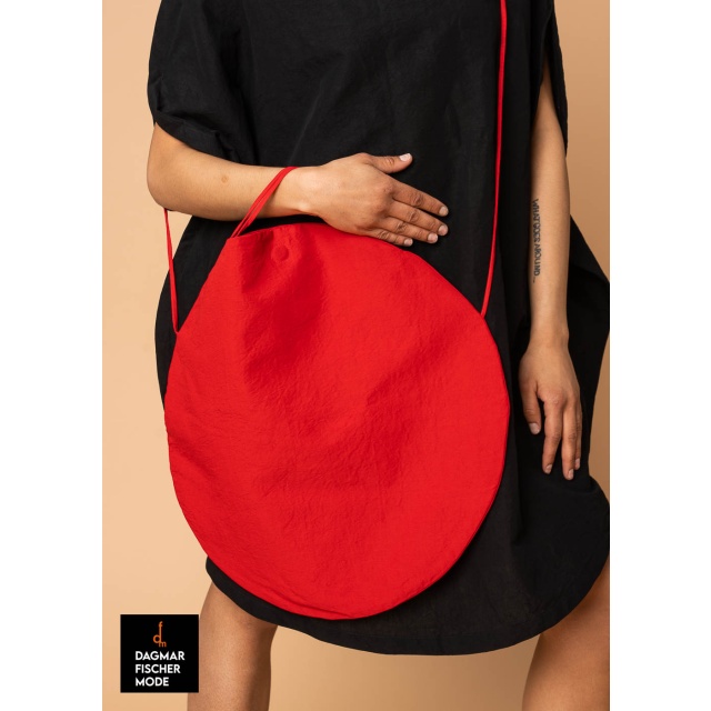Circular handbag by RUNDHOLZ in black, elctric & ketchup
