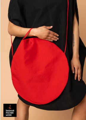 Circular handbag by RUNDHOLZ in black, elctric & ketchup