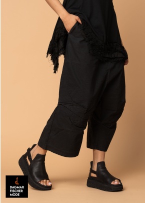 Low crotch trousers by RUNDHOLZ DIP in black gloss